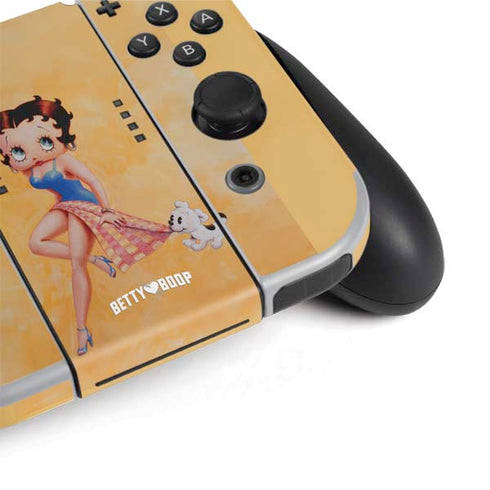 Betty Boop With Puppy Orange Background Nintendo Switch OLED (2021) Skin